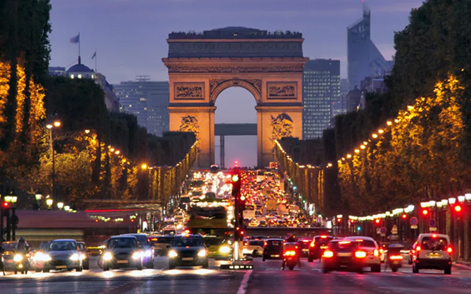 Traffic With Arc De Triomphe In Background Night Time