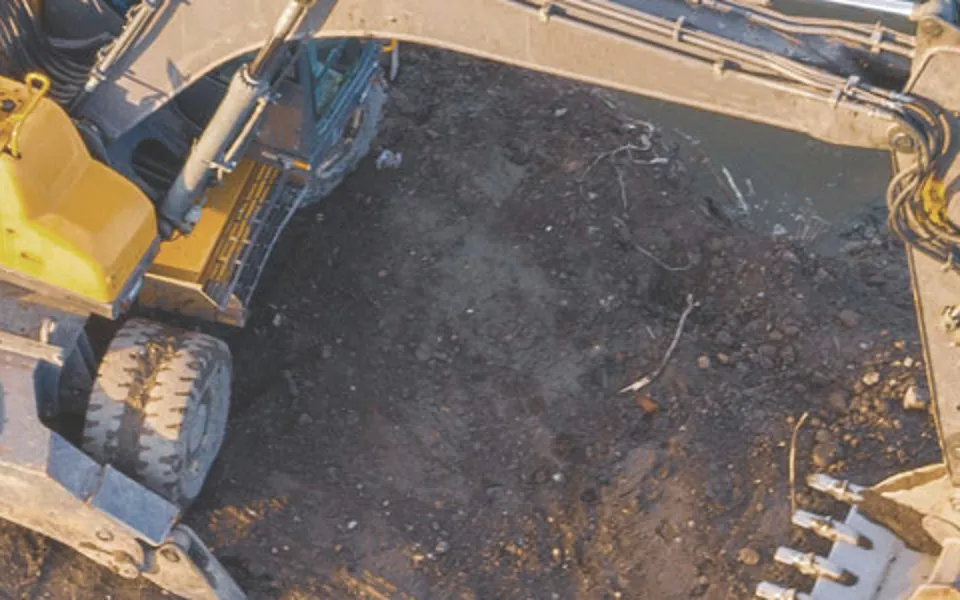 Digger Near Water