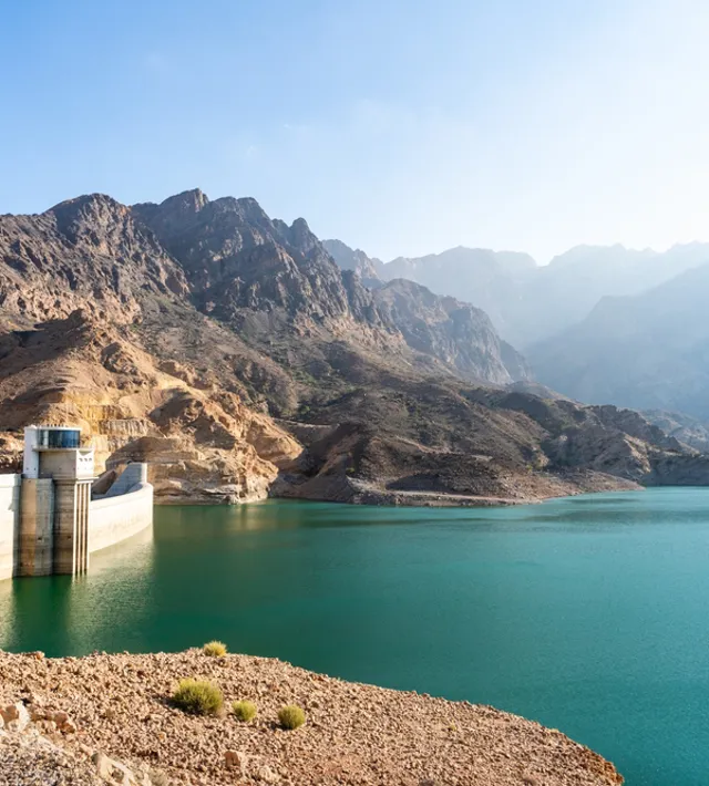 Wadi Dayqah Dam Reservoir With Dam In The Omani Mountain Landscape